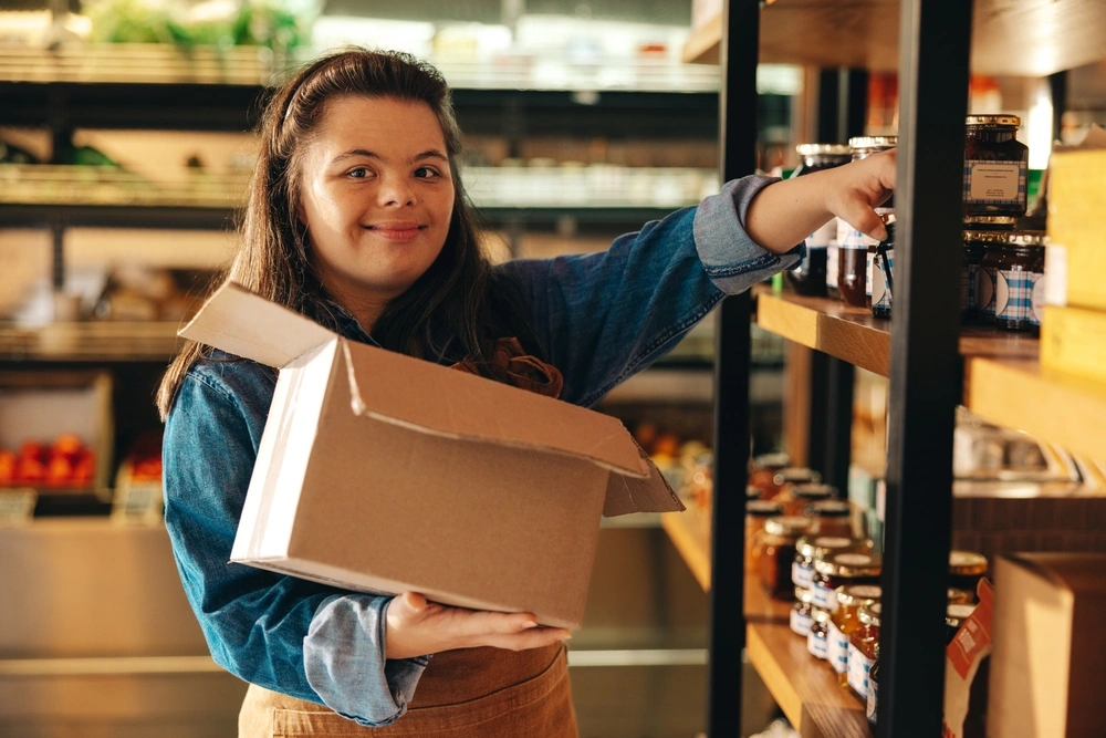 Disabled woman with down syndrome at work
